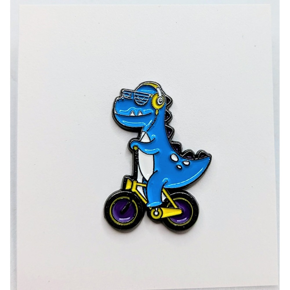 Blue T-Rex Tyrannosaurus Rex Dinosaur With Headphones Riding A Bike Enamel Pin